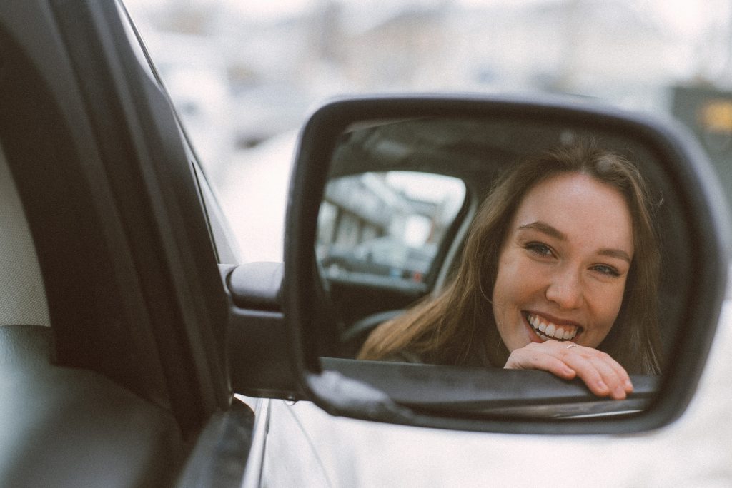 Lady sitting in the driving seat